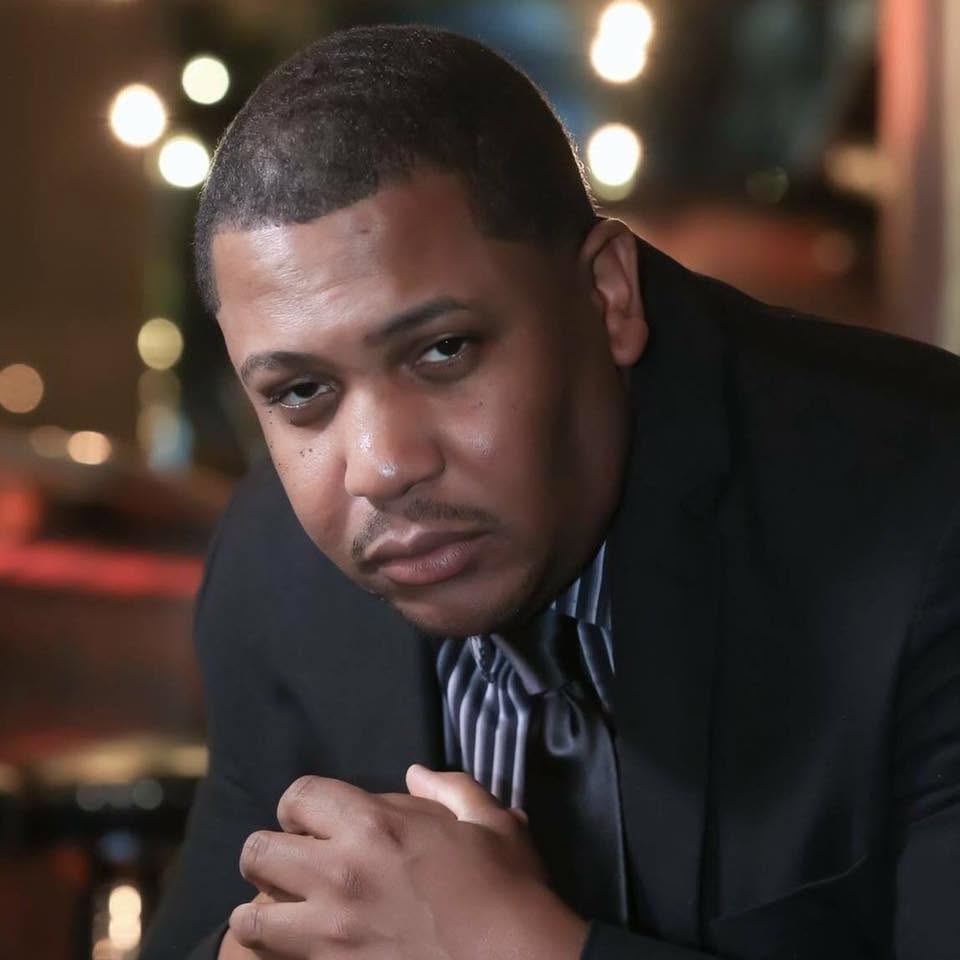 Portrait of Vince Wiley wearing a black jacket
